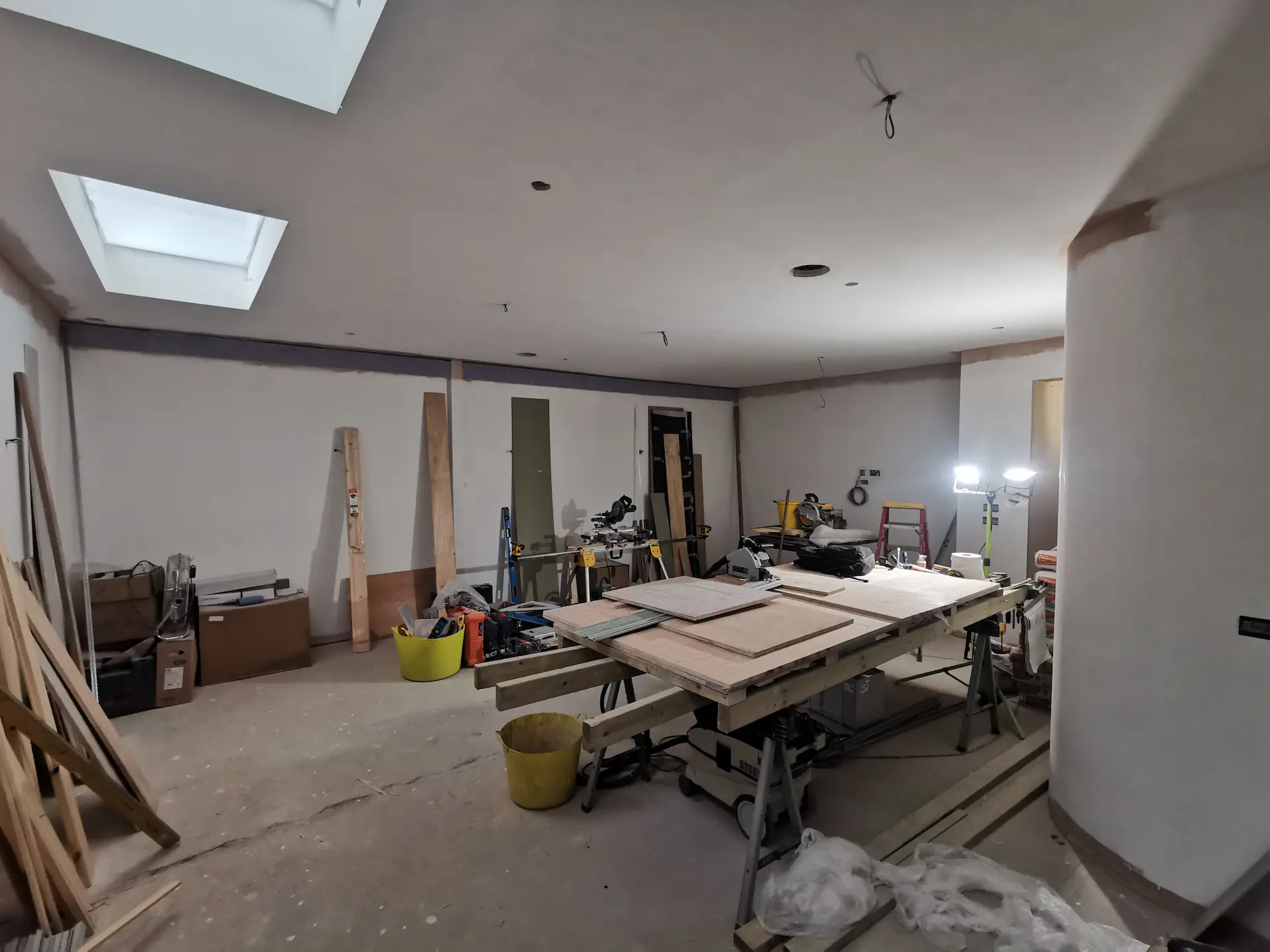 Basement construction in Chiswick with the main room transformed into a temporary joinery workshop