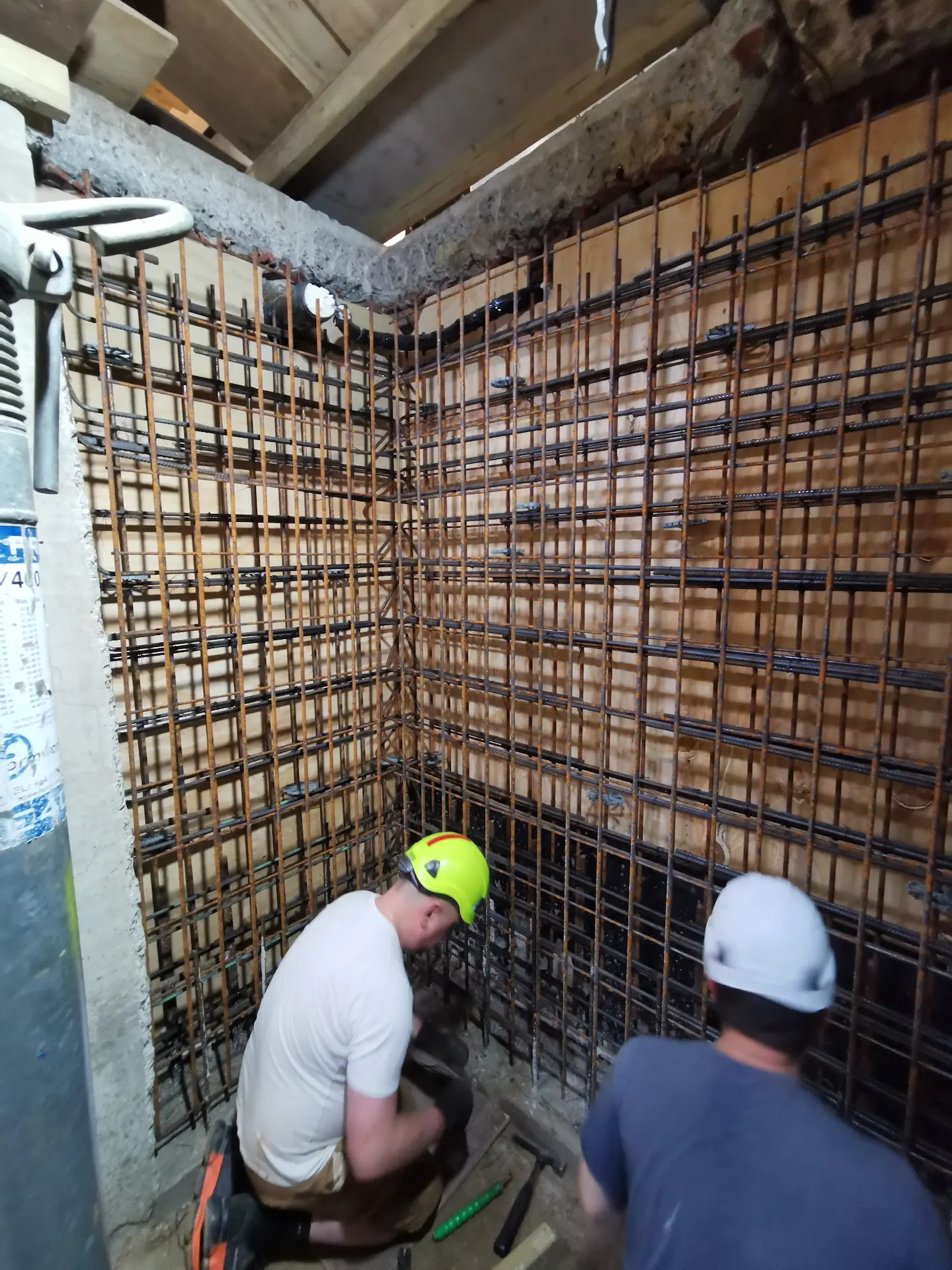 Basement construction in Chiswick highlighting the detailed work on retaining wall reinforcement, ensuring the structure stays robust and durable