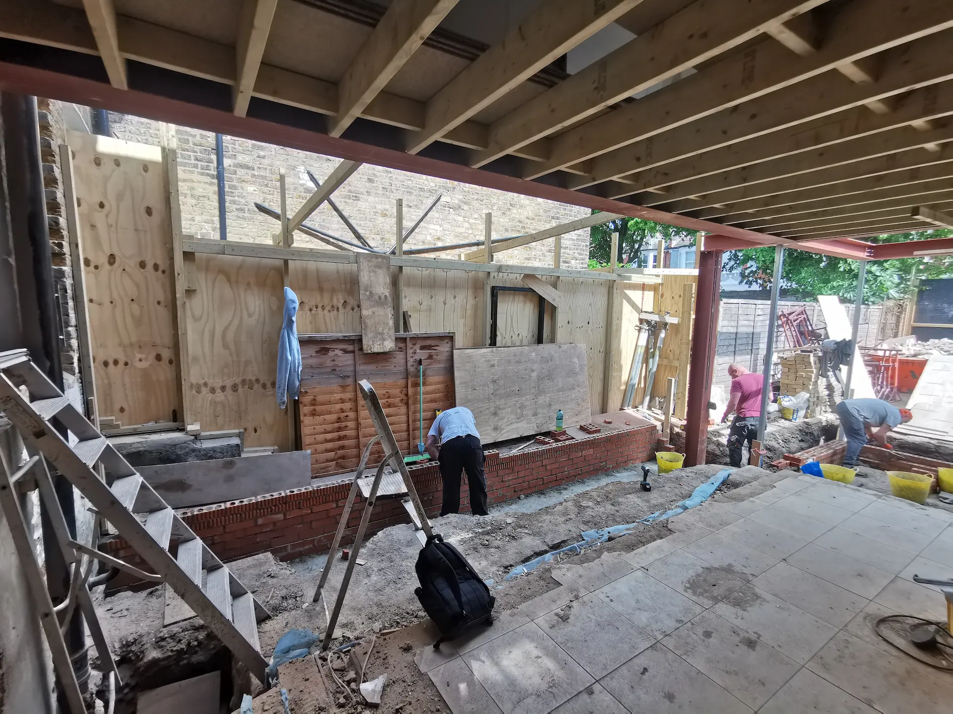 Open plan ground floor extension in Chiswick with exposed steel beams and joists
