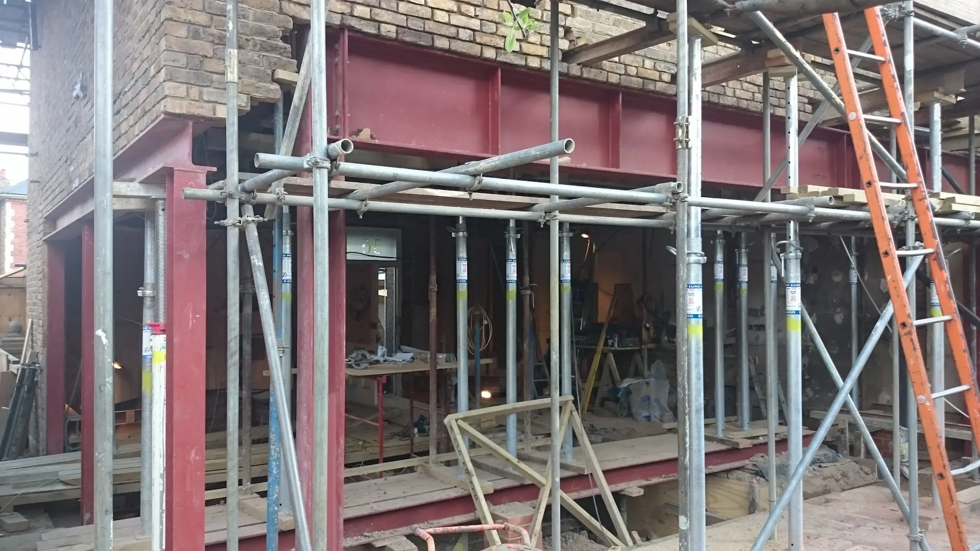 Chiswick house refurbishment showing two steel frames with extensive temporary supports