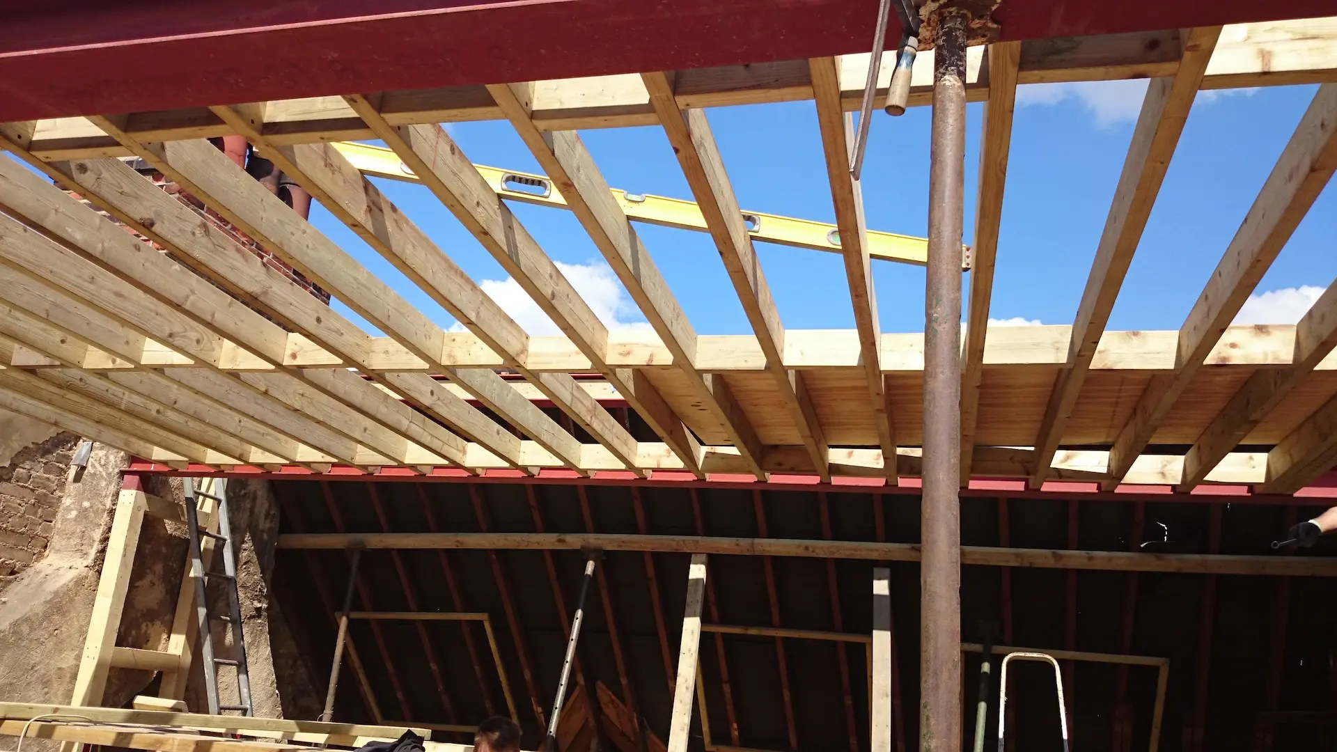 Steel beams and timber rafters installed in the roof structure for a loft conversion in Chiswick, London.
