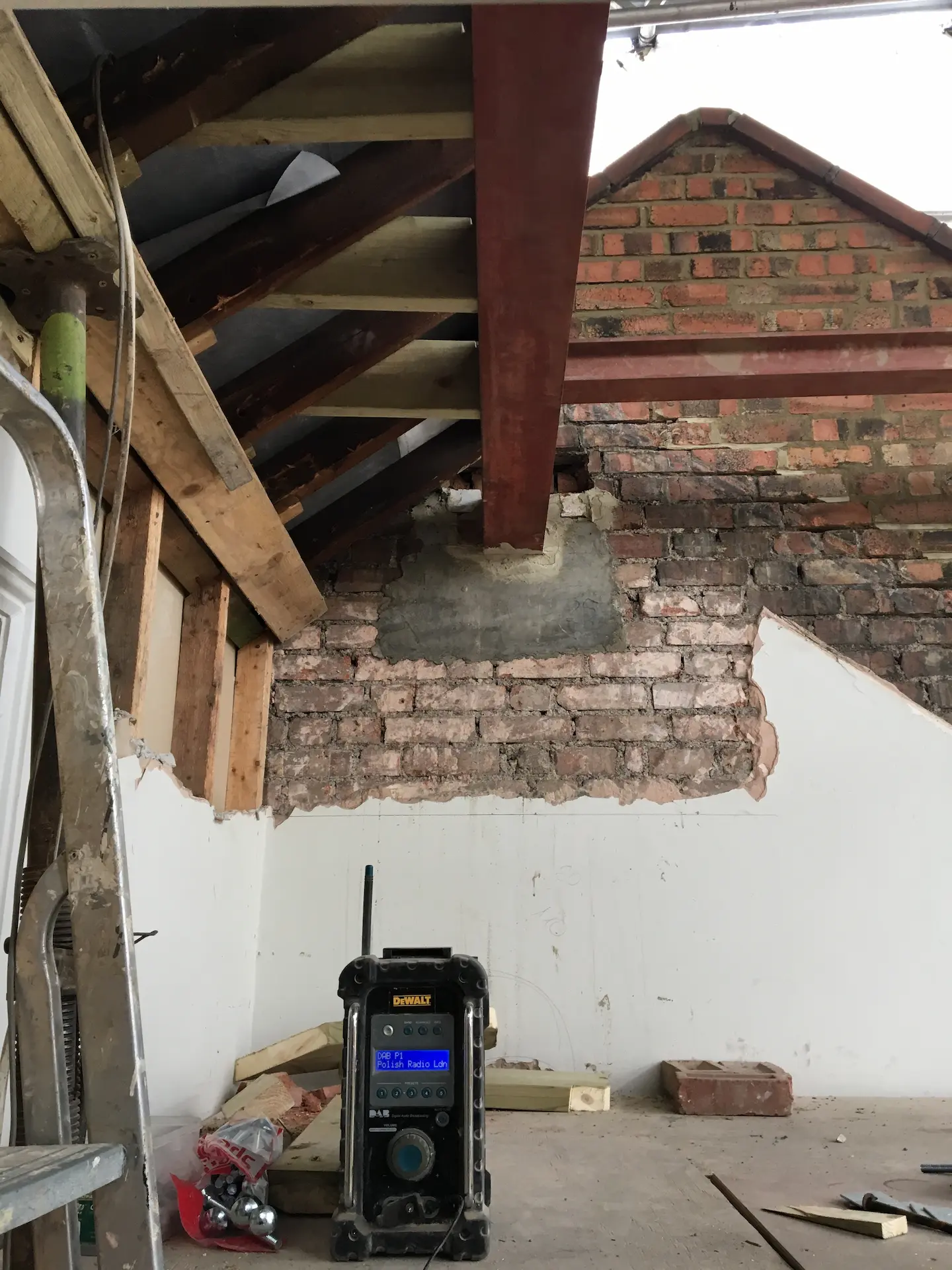 Ridge beam installed to support existing front roof during loft conversion in Ealing